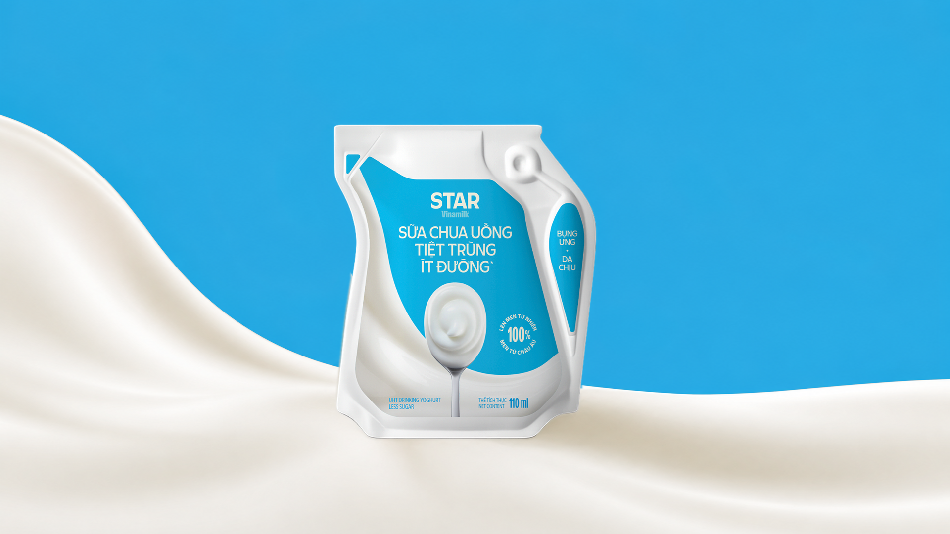 Vinamilk STAR UHT Drinking Yogurt Less Sugar in an Ecolean Air Aseptic package, standing on a white wave of yogurt against a light blue background.